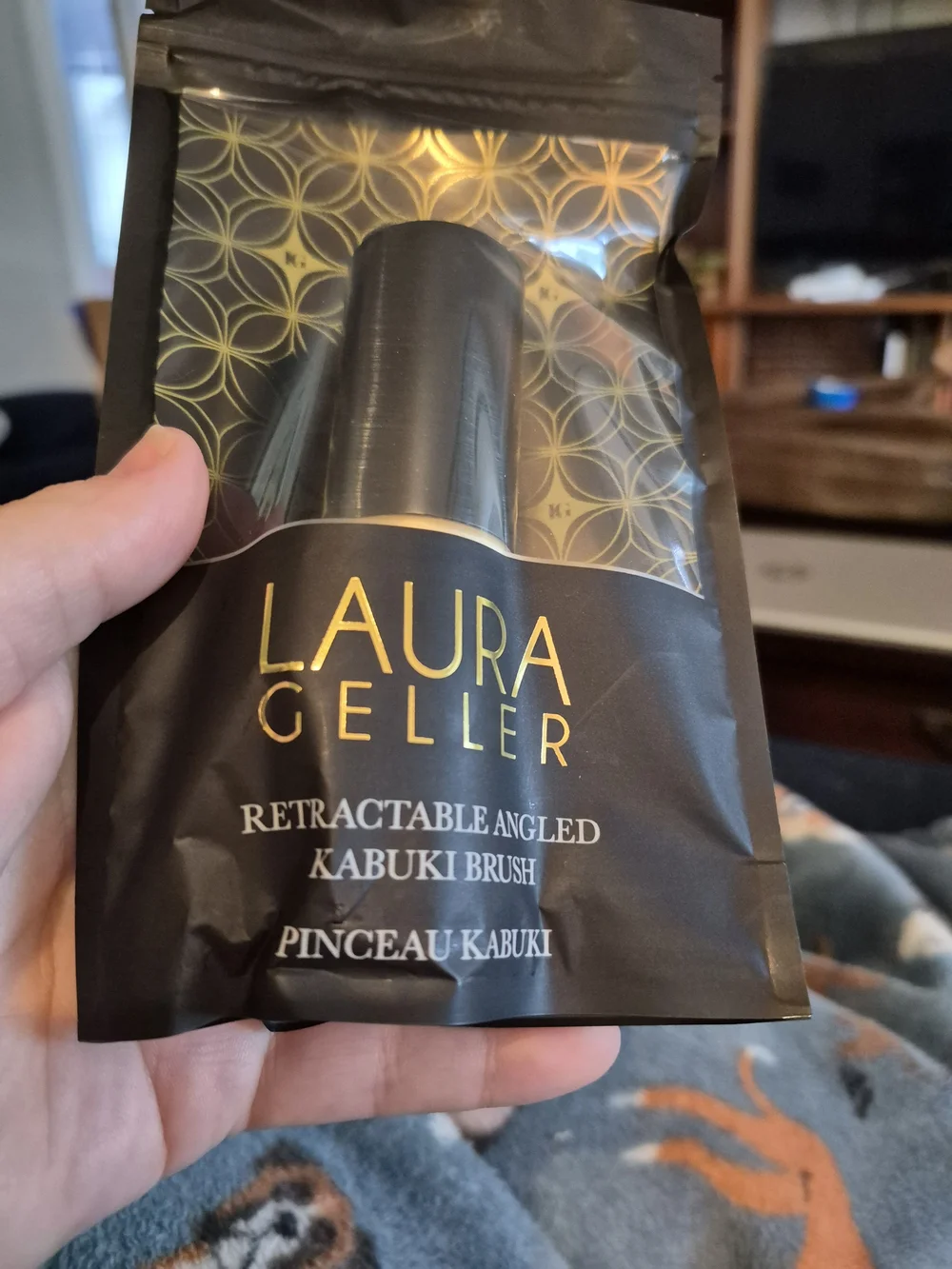 Laura Geller Black and Gold Retractable Angled Kabuki Brush